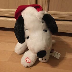Musical Snoopy plush. Spins around and plays Peanuts theme song